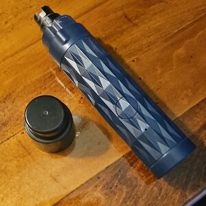 Blue Geometric Patterned Tool For Dogs Nails